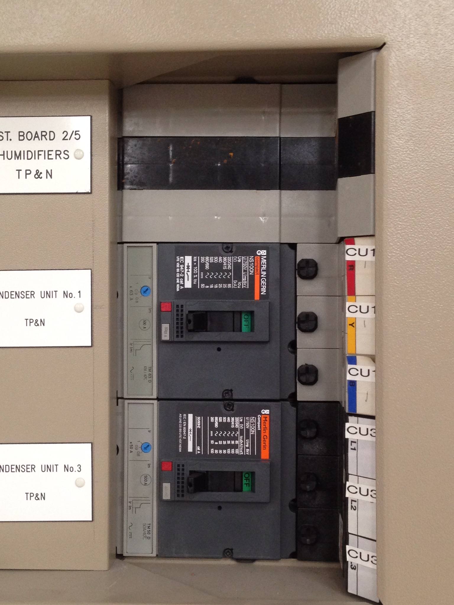 Close-up of labelled electrical distribution equipment